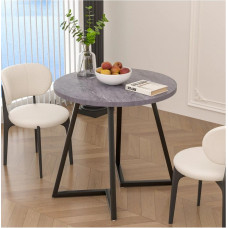 Невеликий круглий обідній стіл на 4 особи